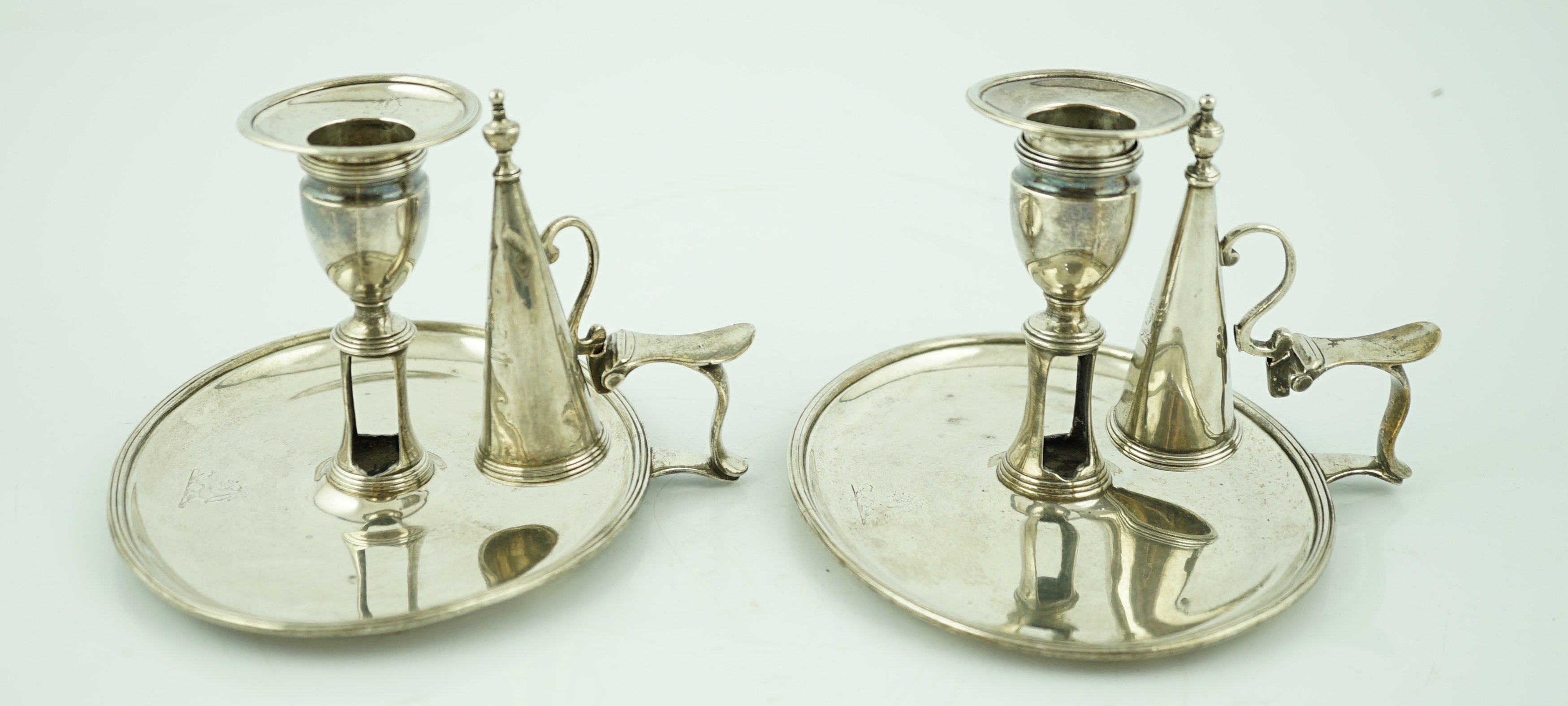 A pair of George III silver chambersticks, by Walter Brind